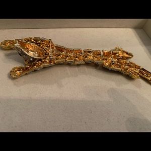 Faceted Austrian crystal adorned Panther Brooch.